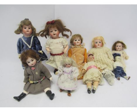 A collection of small bisque head dolls including Heubach Koppelsdorf, Recknagel etc (9, tallest 26cm, some a/f) 