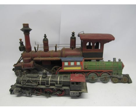 A wooden model American style locomotive, 60cm long, together with a smaller metal example and a novelty set of hooks in the 