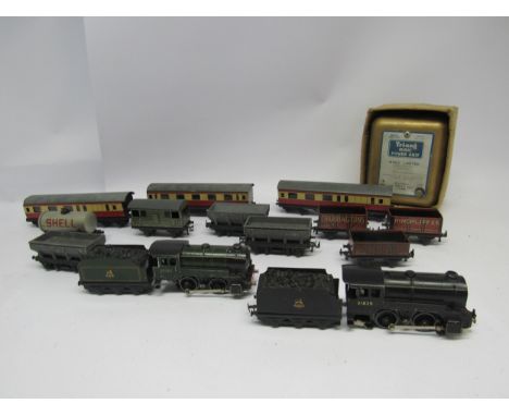 A collection of loose and playworn Trix TTR model railway locomotives and rolling stock including BR green 0-4-0 loco '30782'