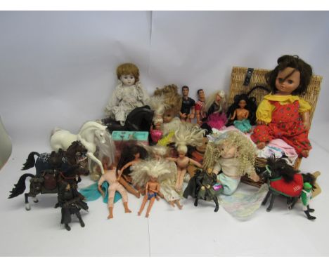 A collection of assorted dolls, action figures and accessories including Barbie, Lord Of The Rings, TY Beanie Boppers, dolls 