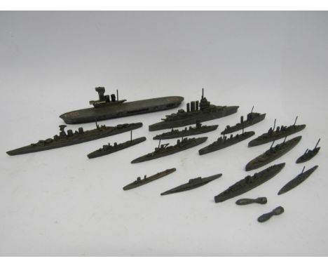 A collection of diecast waterline model ships, "British-Made" to base of some 