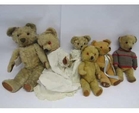 Six mid 20th Century careworn mohair articulated teddy bears including Merrythought example with button to ear (6, tallest 48