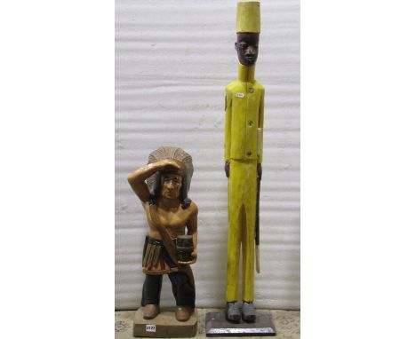 A small painted wooden tobacconists shop advertising figure in the form of a native American Indian 61 cm high together with 