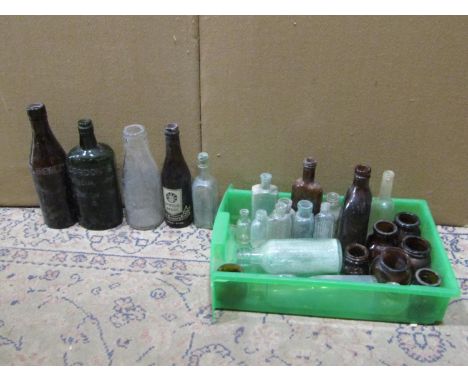 A collection of vintage excavated bottles of varying size and design, together with an Atlas China Art Deco part tea service