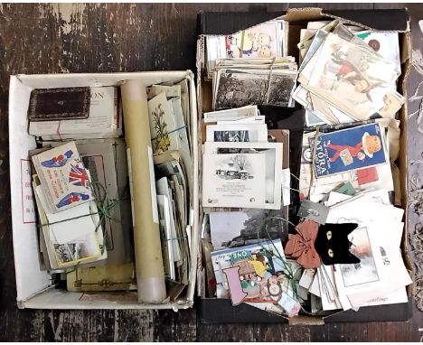 An extensive collection of mixed ephemera to include vintage greetings cards, photographs, postcards to include examples by M