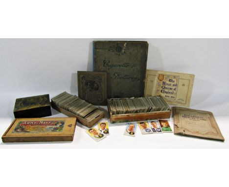 A collection of vintage albums and loose cigarette cards, a Parker Pen 61 set, an Army &amp; Navy pencil case and a Clark &am