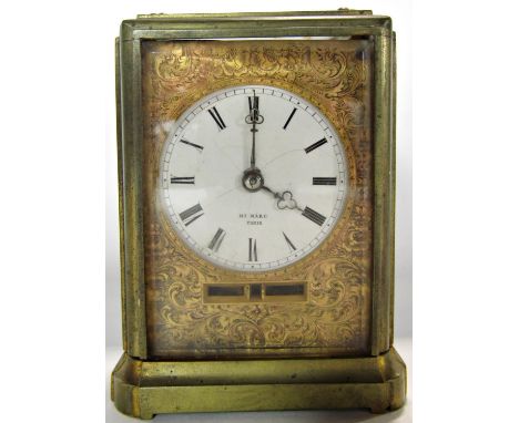 a late 19th century French eight day carriage clock with circular enamel dial set within a chased mask, Henry Marc 