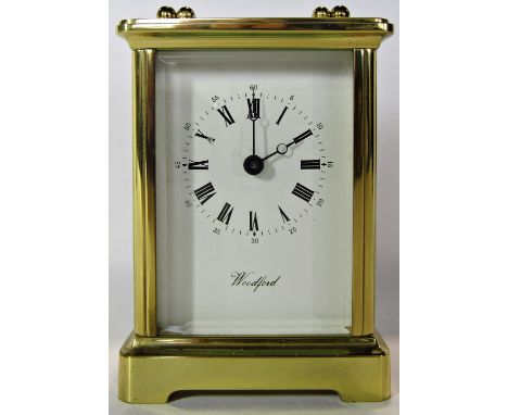 An English eight day carriage clock by Woodford 