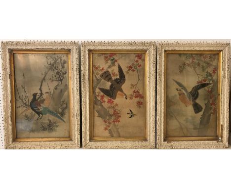 Three framed Chinese paintings on silk of birds in trees (early 20th century), two bearing red seal mark, one without, 50 x 3