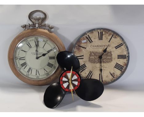 Outsized watch presented as a wall clock, a clock within a marine propeller and one other (all quartz movement) 