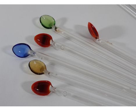 Nine Murano style glass cocktail twizzle sticks with colourful pasta shell tops and a single lollipop twizzle stick,10. 