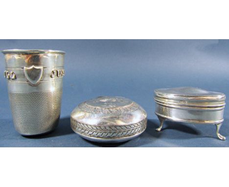 A late Victorian novelty silver stirrup cup in the form of a thimble bearing the inscription 'Just a Thimble full', Birmingha