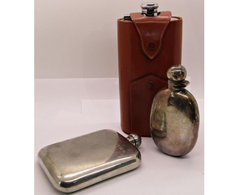 Leather cased chrome travelling spirit flask with four measures and two further flasks 