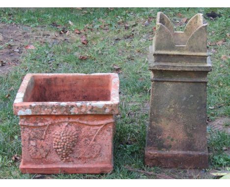 A weathered terracotta square cut and moulded  planter, 48 cm square x 36 cm high together with a buff coloured clay crown to
