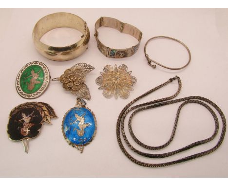 Collection of silver jewellery to include a Siam silver pendant with blue enamel ground, a similar brooch with green and whit