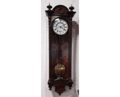 19th century Vienna wall clock with weight driven two train movement within a decorative case 