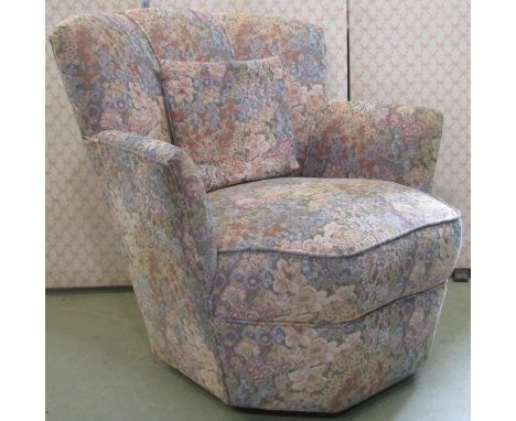A vintage Art Deco style low drawing room/bedroom chair with upholstered finish 