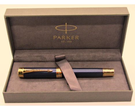 Parker Rollerball pen with blue feathered finish and gold coloured, box, paperwork and refill, unused 