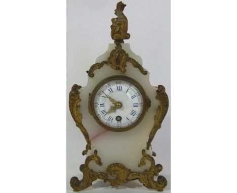 A small 19th century white onyx and brass overlaid rococo style mantel clock, enamel dial and eight day time piece, 22cm 
