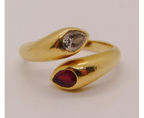 18ct pear-cut ruby and diamond crossover ring, size K/L, 5.8g 