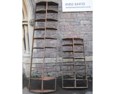 A vintage stained pine open divisional agricultural related rack (reclaimed from a barn) 230 cm long x 65 cm wide together wi
