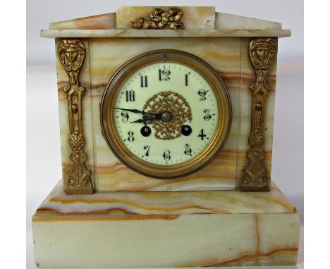 A Victorian onyx mantel clock with applied gilt mounts containing an eight day striking movement 