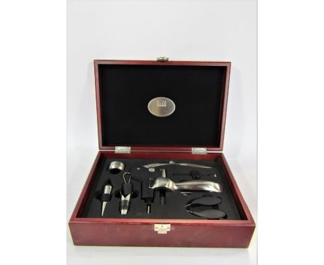 A miscellaneous collection of items including a wheel barometer, a Gurkha style dagger in a leather sheath, a cased box of a 