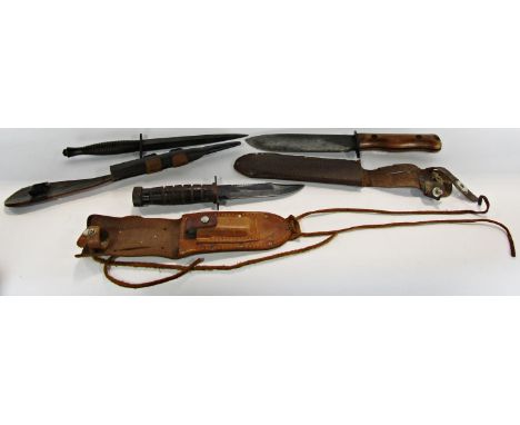 A Wilkinson Sword Bowie type knife with an eight cm blade in a leather sheath, 31.5cm overall, a British Commando type dagger
