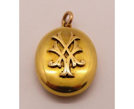 Good quality Victorian yellow metal locket with applied monogram, containing a hand painted portrait of a lady and a lock of 