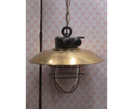 A good quality retro cast iron and polished brass industrial light burning a single bulb, 85 cm diameter x 35 cm in height pl