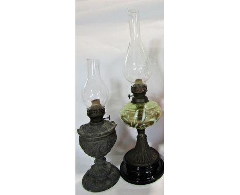 Two Victorian oil lamps, together with a pewter tea service