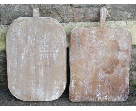 Two vintage rustic pine bread boards, slight variation in size and design 