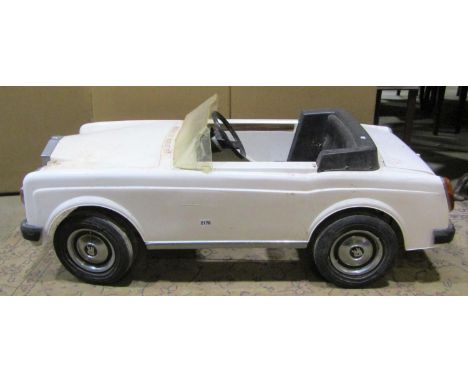 A Child's battery powered scale model toy pedal type car in the form of a Rolls Royce (lacks battery) 