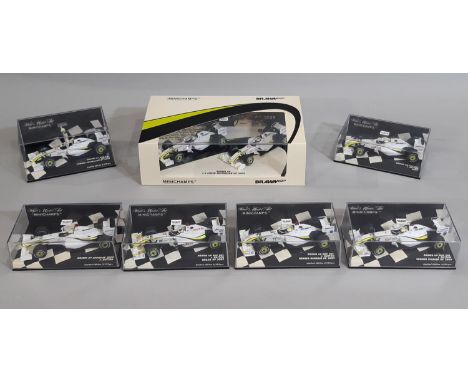 7 cased models of Formula 1 racing cars by Minichamps (Paul's Model Art), all 1:43 scale displaying J Button 2009 Brawn vehic