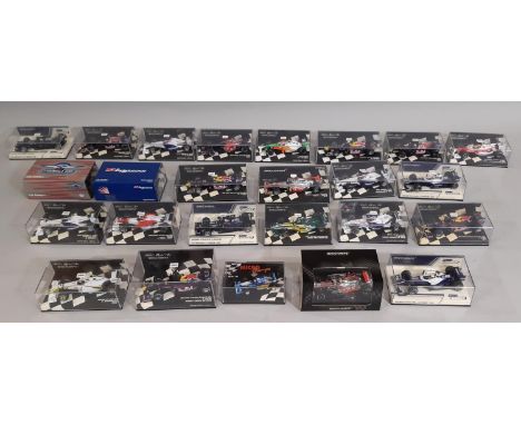 24 boxed Formula 1 racing cars by Minichamps (Paul's Model Art), all 1:43 scale displaying vehicles from 2001-2010 for variou