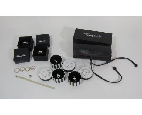 Collection of boxed Thomas Sabo silver jewellery comprising two chain design rings and three charms, plus a Thomas Sabo leath