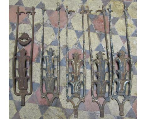 A run of five sections of 19th century cast iron railing with foliate detail, 80 cm high x 14 cm wide (af) 