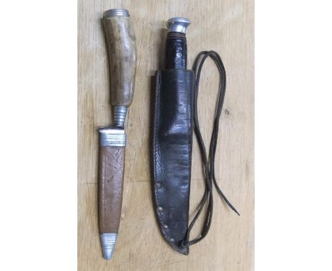 2 Good quality sheathed vintage knives in sheathes,1 is animal horned handle German knife the other British made.Ave length 2