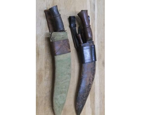 2 vintage Kukri knives, probably ex-military, both in sheathes  