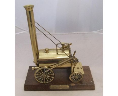 Brass model of Stephensons Rocket on wooden plinth23 x 26 cm  Fine