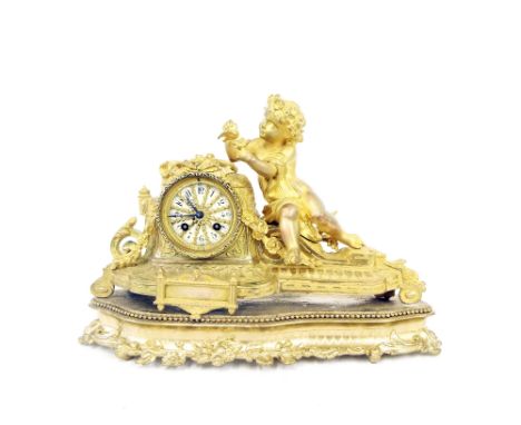 Gilt metal figural two train mantel clock, the movement with outside countwheel striking on a bell, the 3" circular dial with