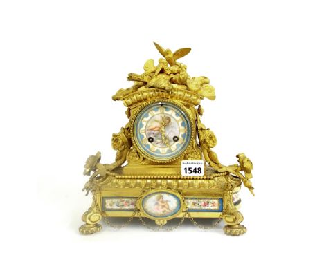 French ormolu and porcelain panelled small two train mantel clock, the Japy Freres movement striking on a bell, the 3" painte