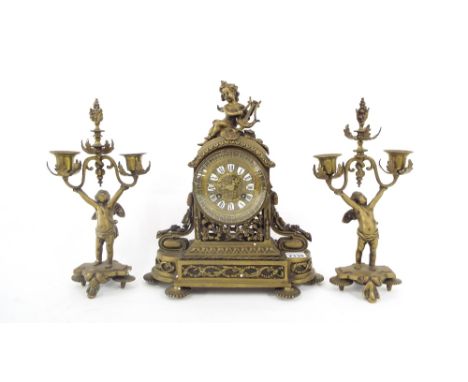 Brass two train mantel clock garniture, the movement with outside countwheel striking on a bell, the 3.5" dial with Roman car
