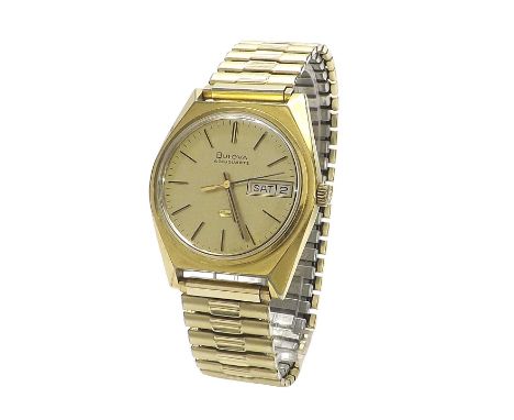 Bulova Accuquartz gold plated and stainless steel gentleman's bracelet watch, the gilt dial with baton markers, sweep centre 