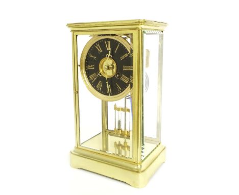 French brass four glass two train mantel clock, the Richard & Co movement striking on a gong, the 4" black slate dial over a 