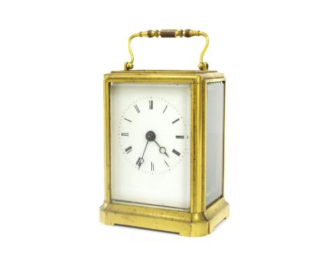 Carriage clock timepiece, within a gilded brass case, 5.5" high