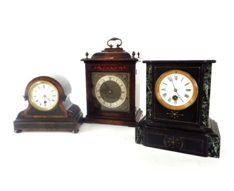 Ebonised and amboyna inlaid drumhead mantel timepiece, the 3.25" white dial within a stepped case, 7.75" high (pendulum and k