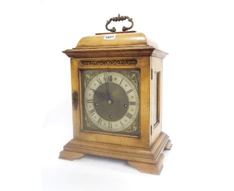 Walnut three train bracket clock, the Empire movement playing on four gongs and striking on another, the 7.25" square brass d