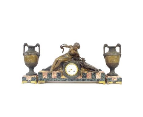 Rouge and green marble spelter two train mantel clock garniture, the movement with outside countwheel striking on a bell (bel