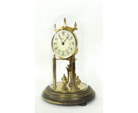 Kundo torsion clock, the 3.5" dial upon brass supports and a stepped circular base, under a glass dome, 12.25" high